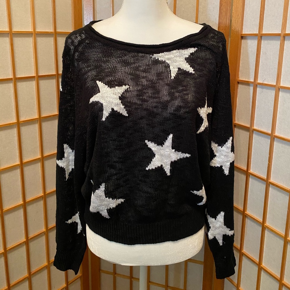 Black star sweater.